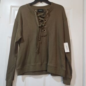 Storia Green top with strings to  tie front close  size Large
